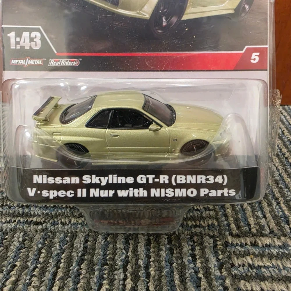 Hot Wheels Nissan Skyline GT-R BNR34 V-spec II Nur 1:43 Premium HMD47 Green
